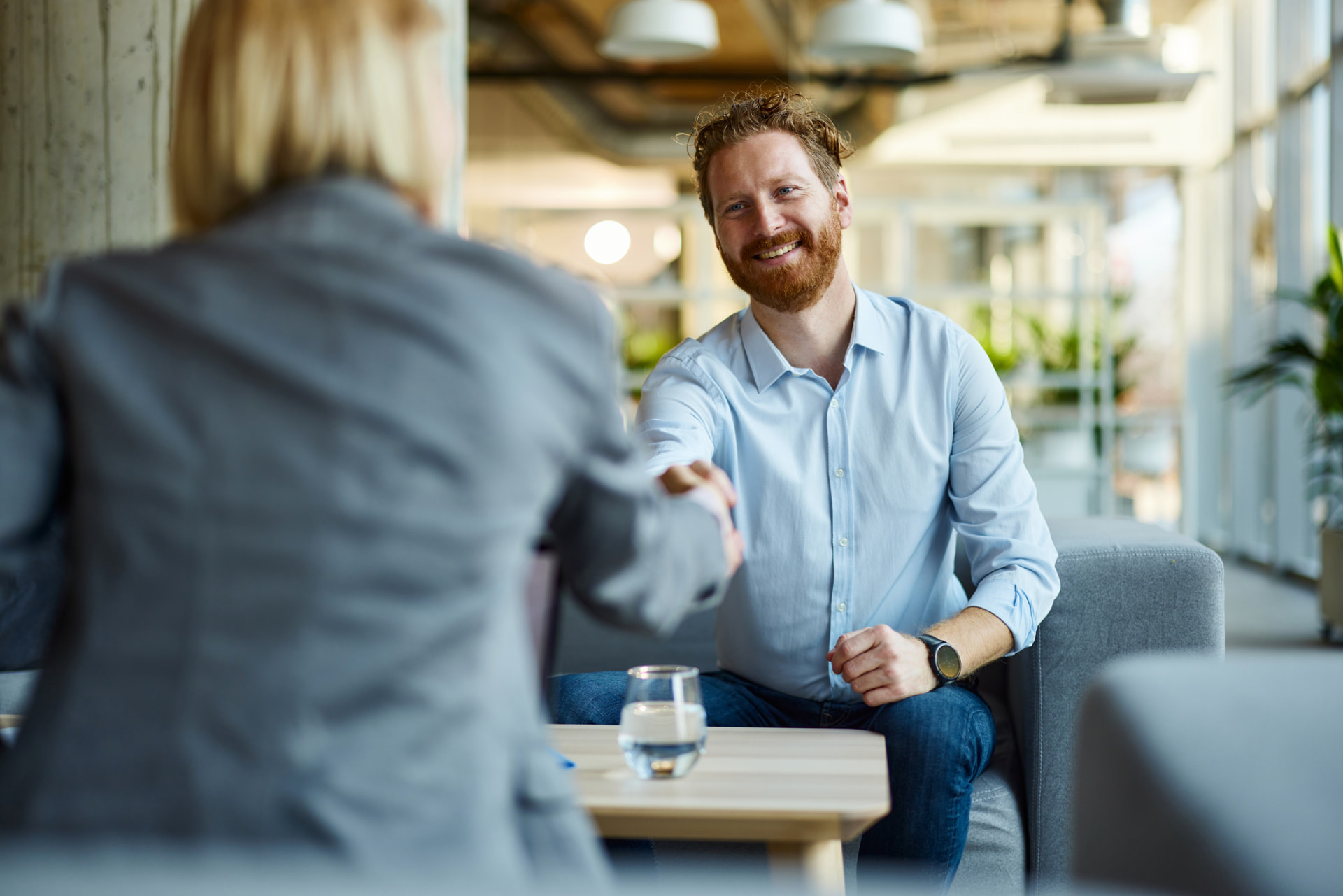 European business professionals shaking hands during a meeting